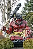 A statue of an oni armed with a kanabō