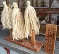 Onusa. Only ramie is attached. Worshippers purify themselves at the entrance to the main shrine of Kasuga Taisha.