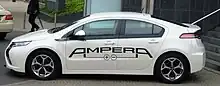 Side view of a white 4.5-meter long liftback with AMPERA livery