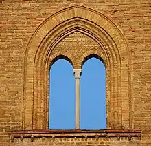 Open sky bifora in the facade of San Francesco Church