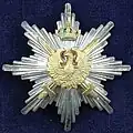 Monarchy - Grand Cross star with swords.