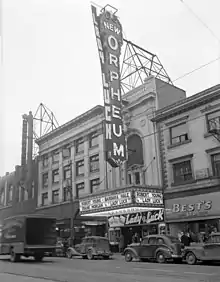 The Orpheum Theatre with advertising for the movie Lady Luck ; note the Commodore Ballroom on the left. circa 1946