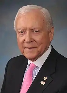 Upper-body portrait of a twenty-first-century man in a suit.