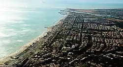 Aerial view of Ostia, with the Tiber and its mouth in the background