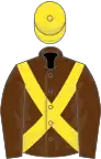 Brown, yellow cross belts and cap