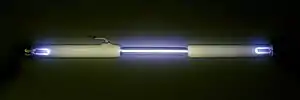 Gas discharge tube filled with oxygen O2.