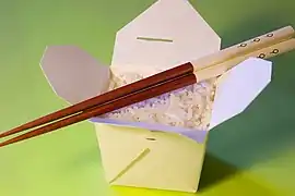 Boiled rice served in an oyster pail.