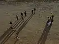 Playing pétanque in the late afternoon at Aigues-Mortes