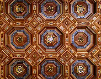 The ceiling of the ballroom, designed by Philibert Delorme, with the symbols of Henri II and his mistress Diane de Poitiers: "HD" cyphers, three interlaced crescent moons, and Henri II's main cypher: a crowned H above a crescent moon