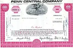 Pink-colored, 100 share stock certificate of Penn Central Company