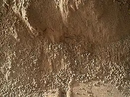 "Rocknest" sand on Mars – scoffmark made by the Curiosity rover (MAHLI, October 4, 2012).