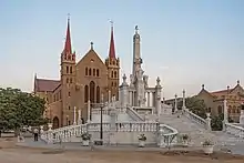 Monument to Christ the King with Saint Patrick's Cathedral