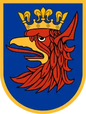 The arms of Szczecin are exempt from the rule of tincture because the crowned griffin's head is of a colour and metal.