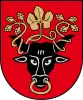 A coat of arms depicting the black head of a bull with a golden vine entangled in its black horns and a golden ring protruding from its nose