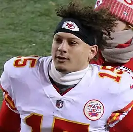 Headshot of Patrick Mahomes in uniform (sans helmet)