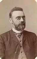 photograph of elderly man with glasses