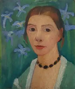 Self-portraitwith green background and blue irises (c. 1905)