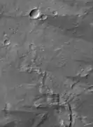 Mars Global Surveyor MOC image showing mantle of dust near summit of Pavonis Mons. The dust makes the image look blurry.