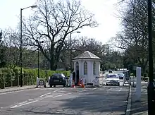 Paying the toll at the College Road, SE21 tollgate, which dates back to 1789