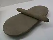 Stone roller and quern from the Peiligang site