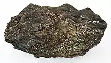 Pentlandite occurring with chalcopyrite and pyrrhotite. Specimen from Sudbury, Ontario, Canada