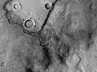 Periglacial forms in Utopia, as seen by HiRISE, showing patterned ground and scalloped topography. Image in Casius quadrangle.