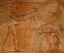 Fig. 1. Perseus, with averted gaze, decapitating a centaur-bodied Medusa; Boetian relief pithos, Louvre CA 795 (mid seventh century BC