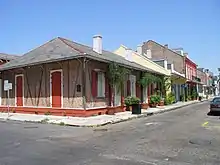 Gabriel Peyroux House in New Orleans, built c. 1780, is an example of briquette-entre-poteaux (brick-between-post) construction.