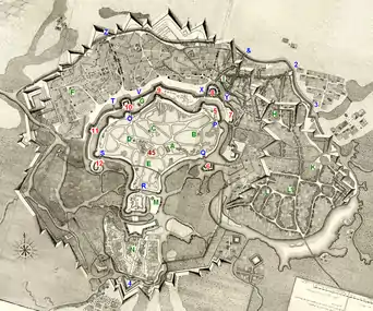 The plan of Ottoman Fortress Temişvar, on Perrette's map (see below). The notations are those used by Opriș.Red numbers are bastions, blue markers are gates and green letters are mosques.