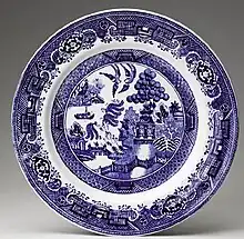 A plate with a blue willow pattern like Janey Larkin's