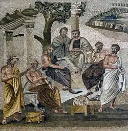 Image of mosaic from a villa in Roman Pompeii, showing Plato's Academy in ancient Athens, with men in robes, some seated on a bench under a tree