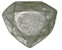 Lead cast of the "French Blue" diamond, discovered in 2007 at the National Museum of Natural History (France) by Farges (ca. 31 mm × 26 mm (1.2 in × 1.0 in)).