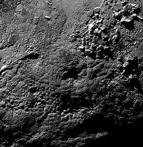 Pluto's possible cryovolcano Wright Mons, showing its central depression