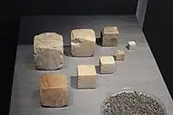 Cubical weights, standardised throughout the Indus cultural zone; 2600–1900 BC; chert; British Museum (London)