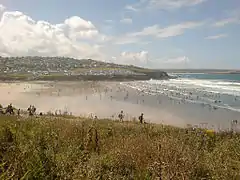 Trebetherick on the hill beyond Polzeath beach