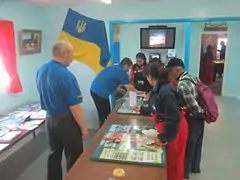 Tourists visit the post office inside Vernadsky Station