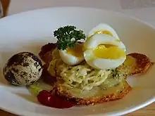 Quail eggs with potato galettes