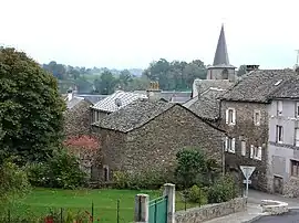 The church and surrounding buildings in Prades-Salars