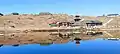 Dry winter view of Prashar Lake and temple