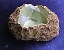 Prehnite nodule fragment, 11.0 cm × 7.0 cm, 338 grams.