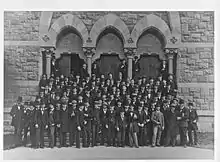 A picture of the Princeton University Class of 1879, posing on the steps of the John C. Green School of Science