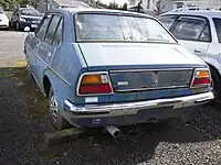 The rear view of a Toyota Publica Starlet Sedan