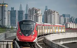 Hyundai Rotem EMU Set 216 entering Kampung Batu Station.