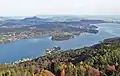 View from the new tower toward the northeast. The lake Wörthersee and Maria Wörth peninsula  are clearly visible. Klagenfurt is at right.