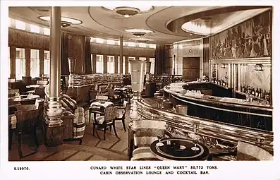 Observation Bar. Note the lower band of windows that look into the enclosed Promenade Deck. They were removed in 1967 after the lounge was extended.