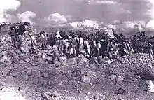 Palestinians returning to Qibya shortly after the Qibya massacre.