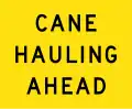 (W5-Q07) Cane Hauling Ahead (This flag is used with the guide sign sugar cane area.) (used in Queensland)