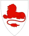 Arms of Rødøy Municipality in Norway, showing a lion couchant gules (1988)