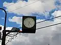 R.S.L. clock, Jandowea, Queensland, Australia.  Numbers on the clock face are replaced by the words "Lest we forget".