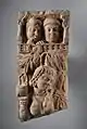 Yakshi with onlookers, dated 20 BCE.
